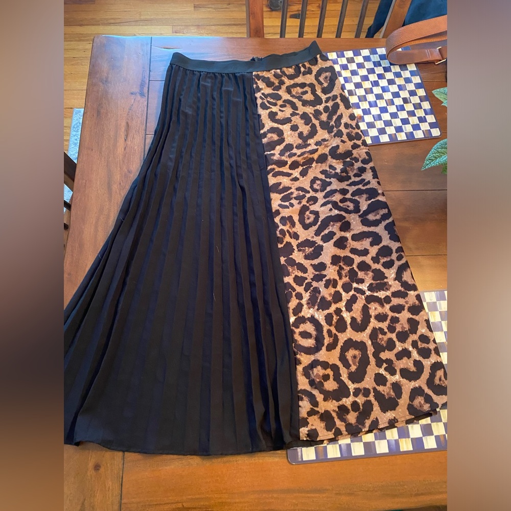 Cheetah and black skirt